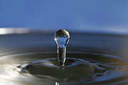 180px-Water_droplet_blue_bg05